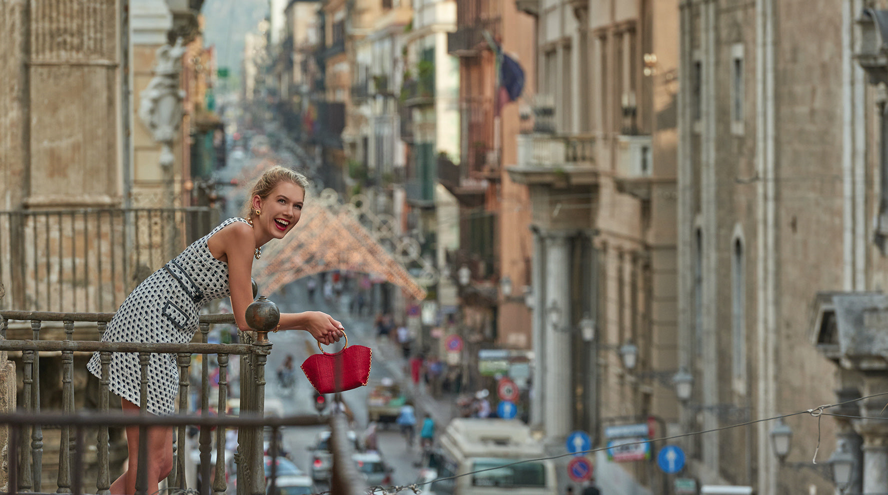 Model wearing handcrafted gold jewellery inspired by Sicily.