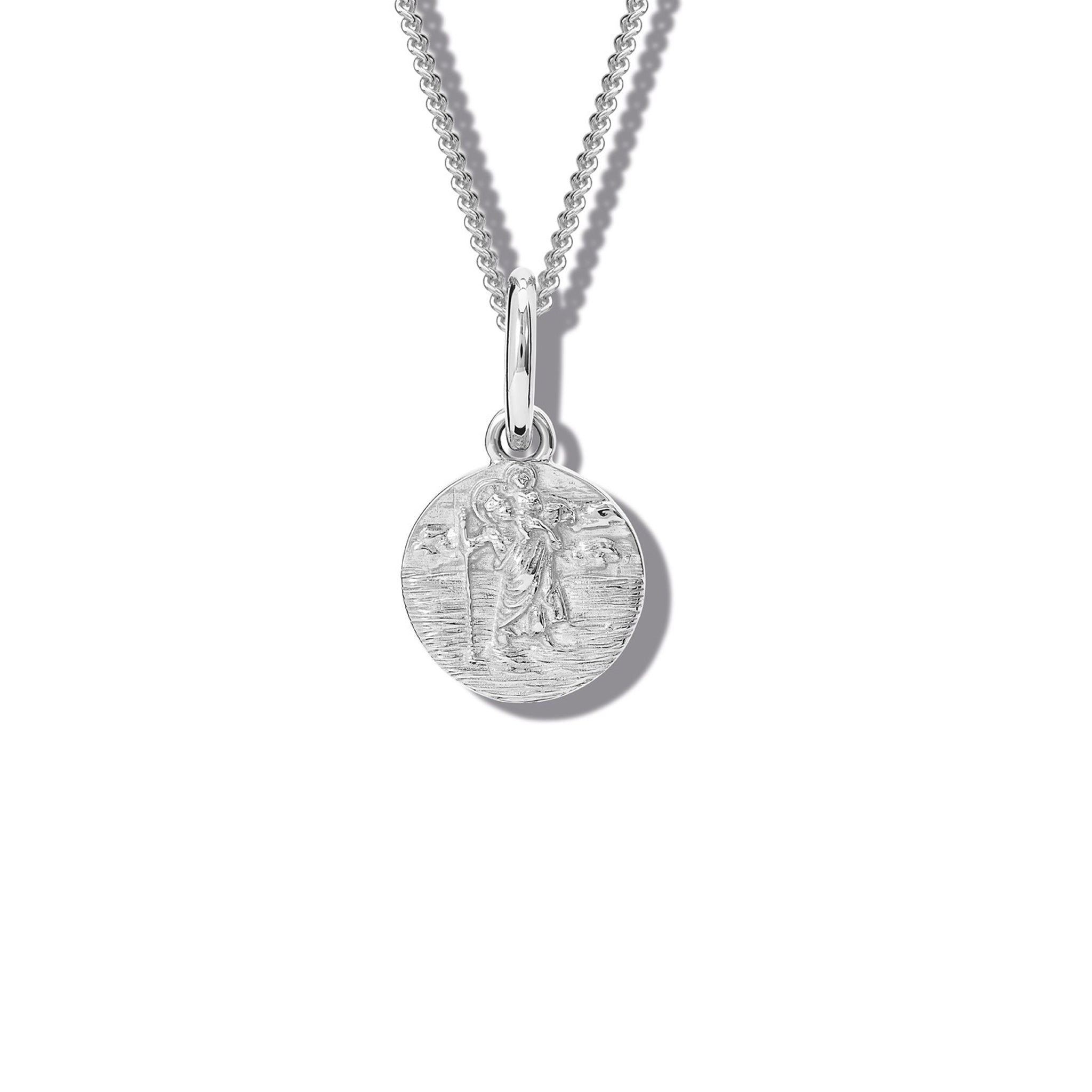 Handcrafted round sterling silver necklace pendant featuring an engraving of Saint Christopher, hanging from a silver chain.