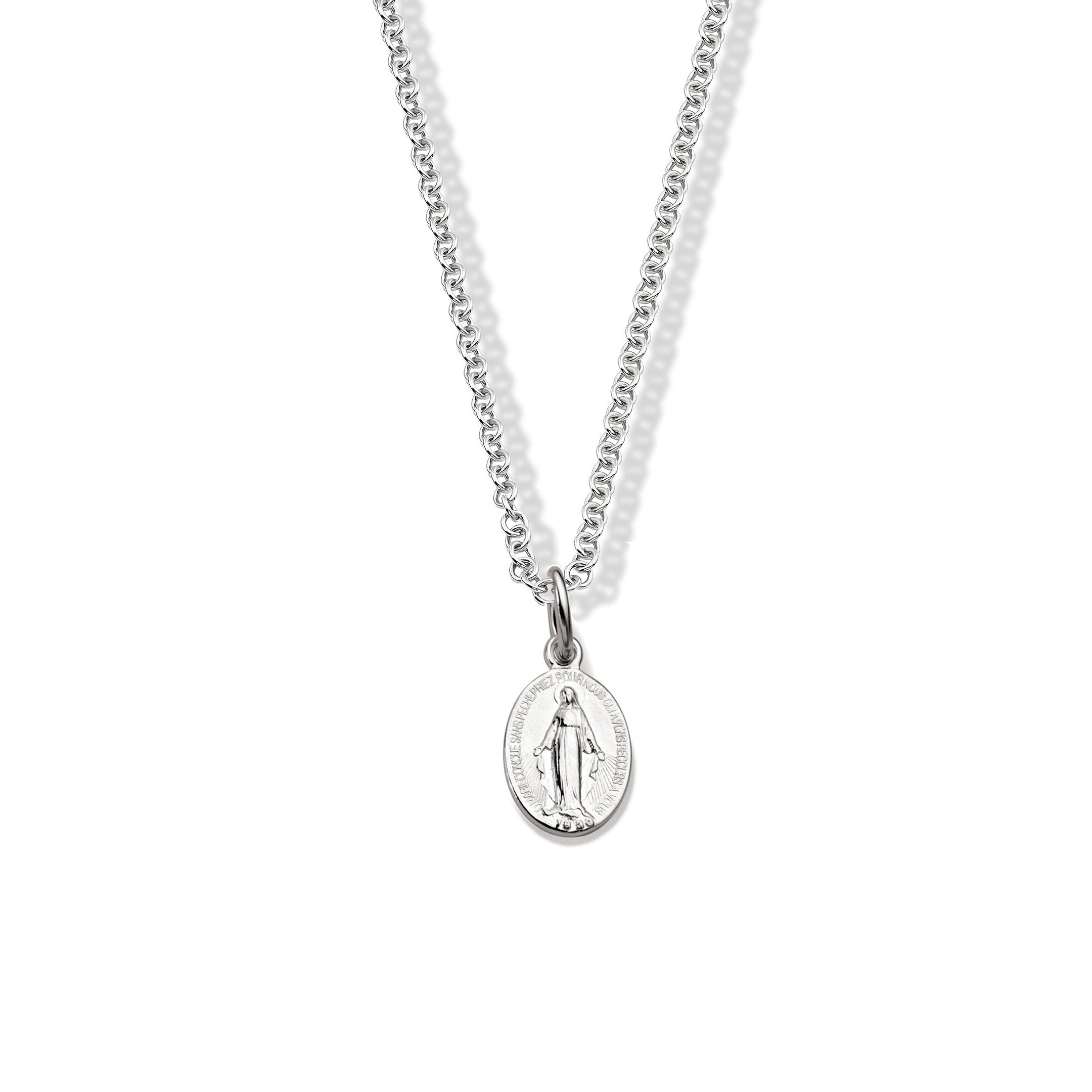 Handcrafted round sterling silver necklace pendant featuring an engraving of Saint Marie Miraculeuse, hanging from a silver chain.