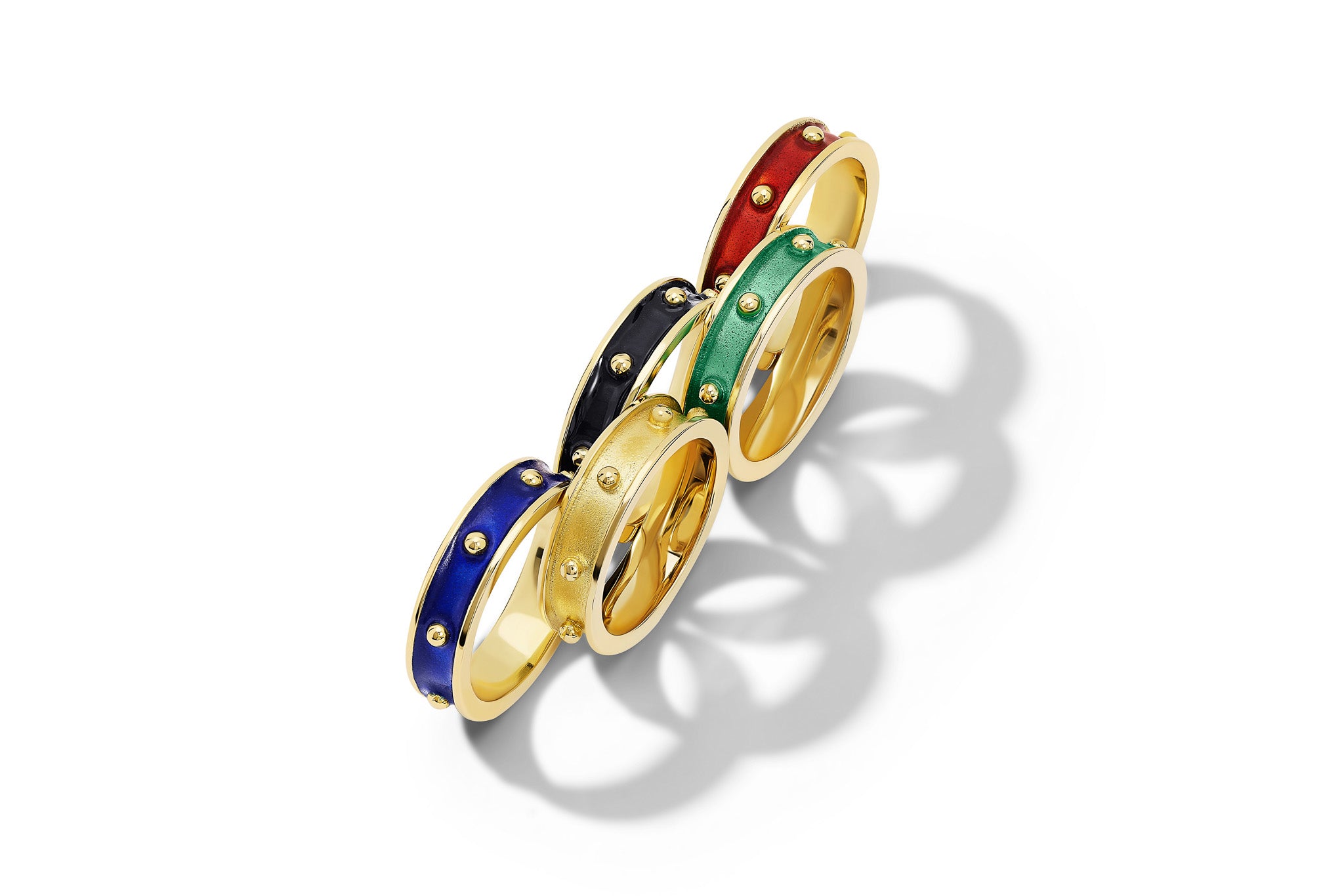 Handcrafted yellow gold Decimus rings in the shape and colours of the Olympic rings.