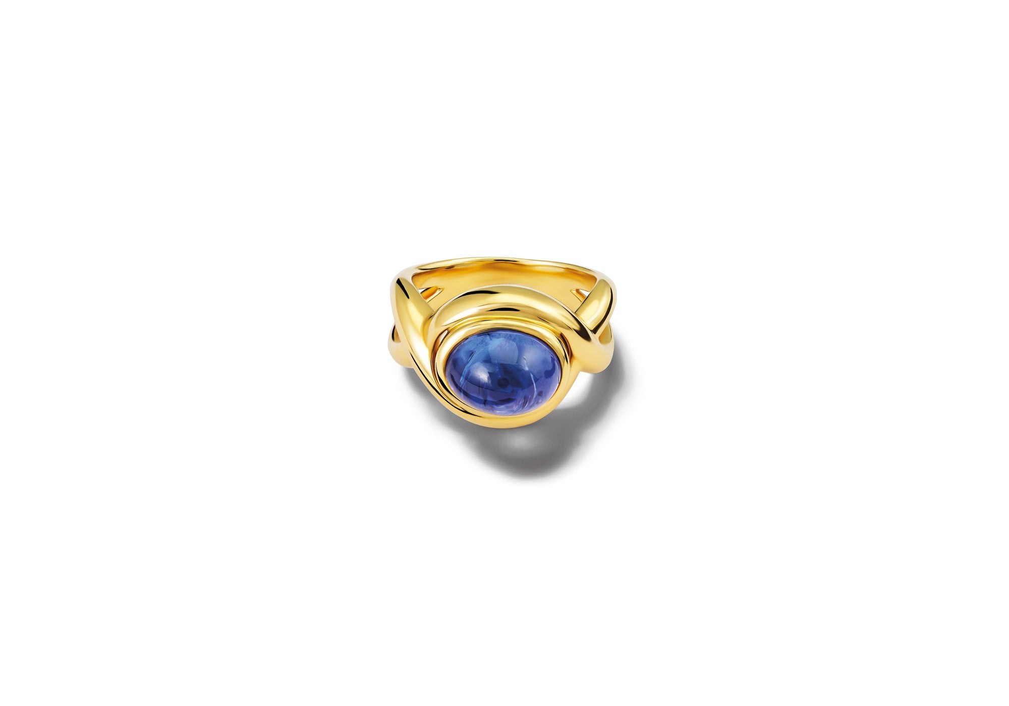 Handcrafted yellow gold ring with a twisted shank featuring a cabochon cut precious gemstone.