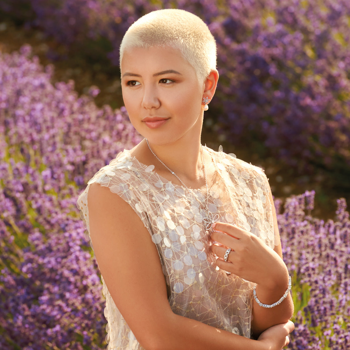 Model wearing handcrafted white gold jewellery inspired by Turkey and Bulgaria.